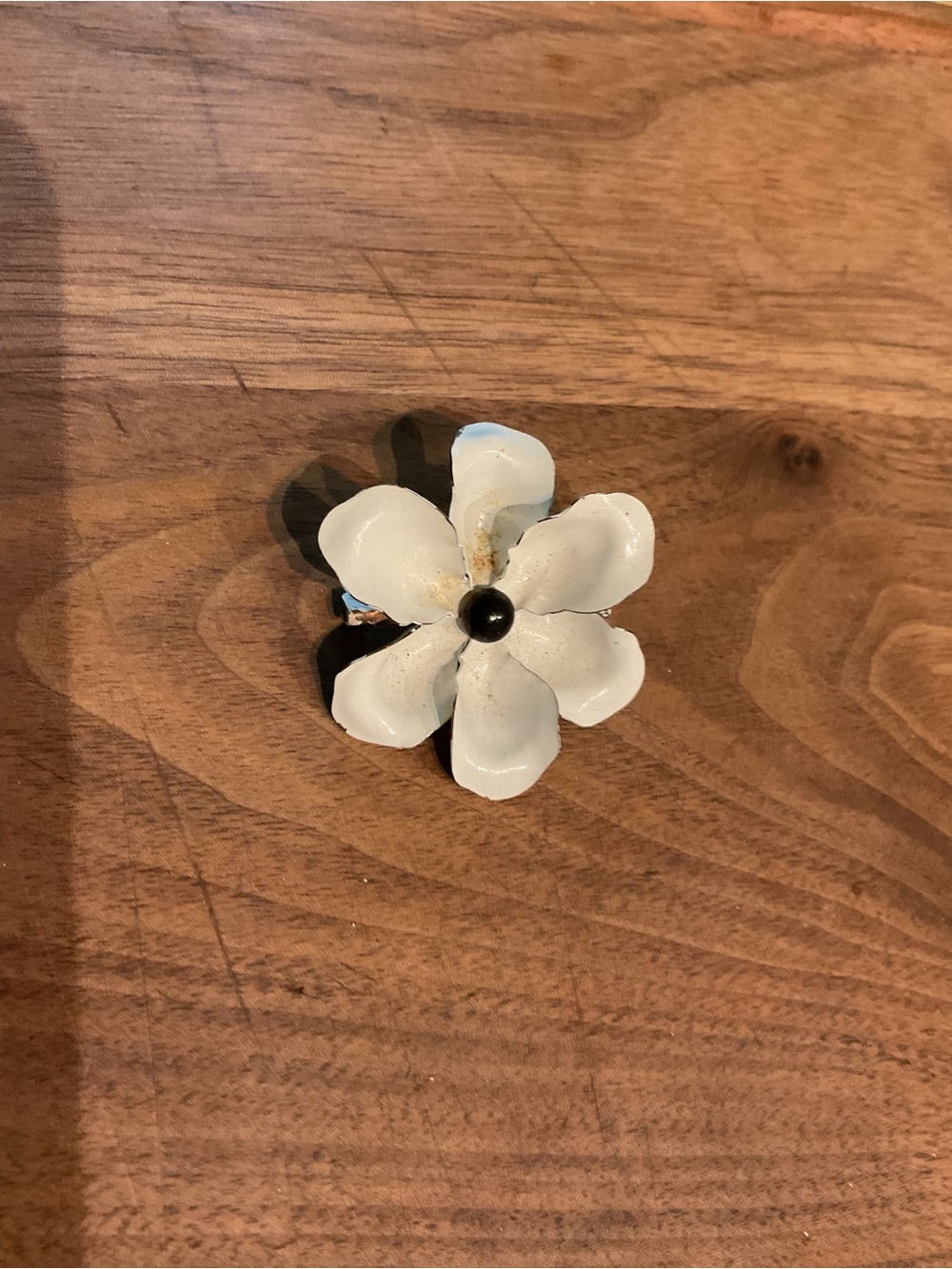 White enamel flower brooch